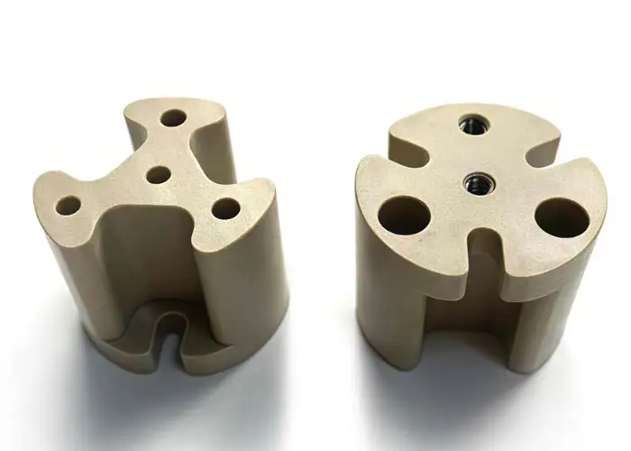 PEEK material CNC medical application display showing biocompatible plastic parts for precision manufacturing