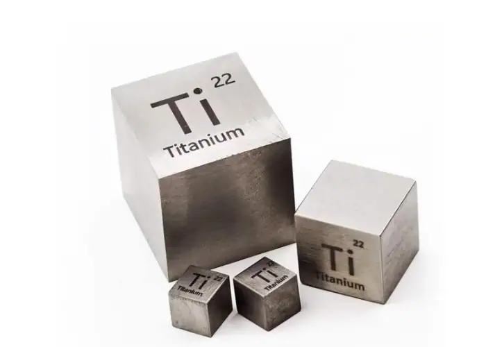 Titanium metal blocks showing the Ti element symbol and atomic number 22