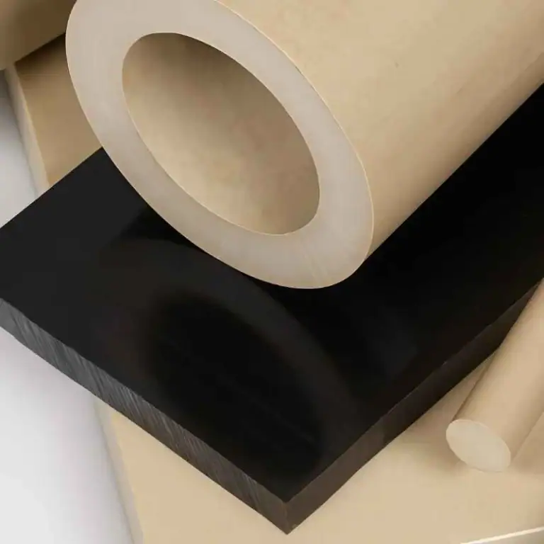 Yellow and black PEEK material display showing high-performance plastic stock for precision CNC machining