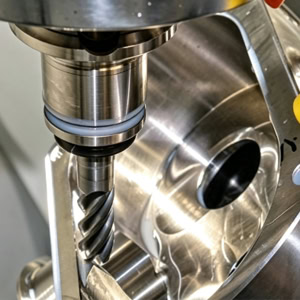 5-axis CNC machining center milling scenario.