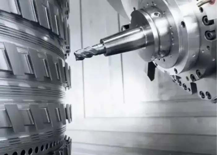 CNC cutting tool machining a metal component and creating a controlled surface finish