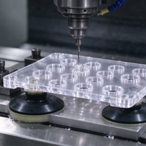 What Is the Difference Between CNC Drilling and CNC Milling for Plastic Parts?