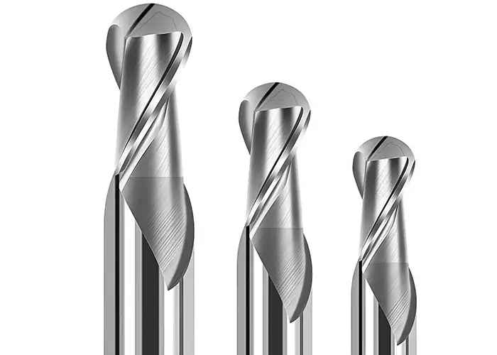 Three ball nose end mills with rounded tips and helical flutes