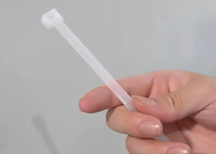 Glass filled nylon cable tie demonstrating the material's stiffness and structural performance
