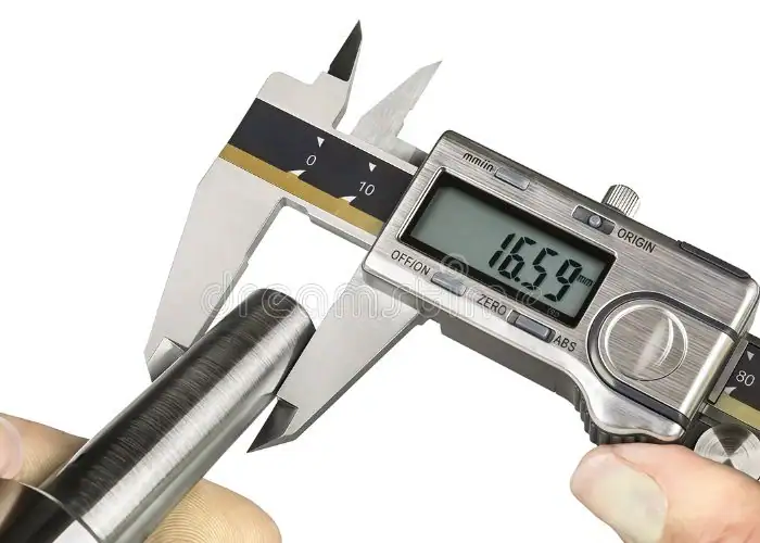 Measuring 316 stainless steel cylindrical workpiece with vernier caliper