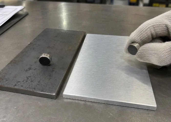Side by side comparison, magnet sticks to iron but not aluminum, metal identification for machining
